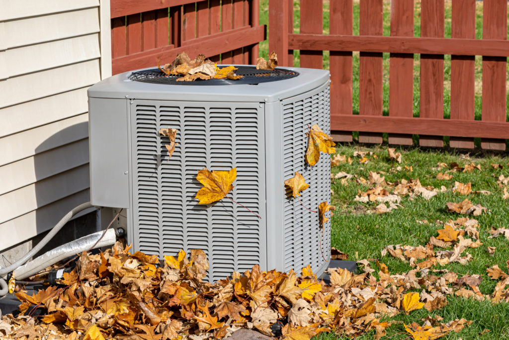 Leaves covering outdoor AC