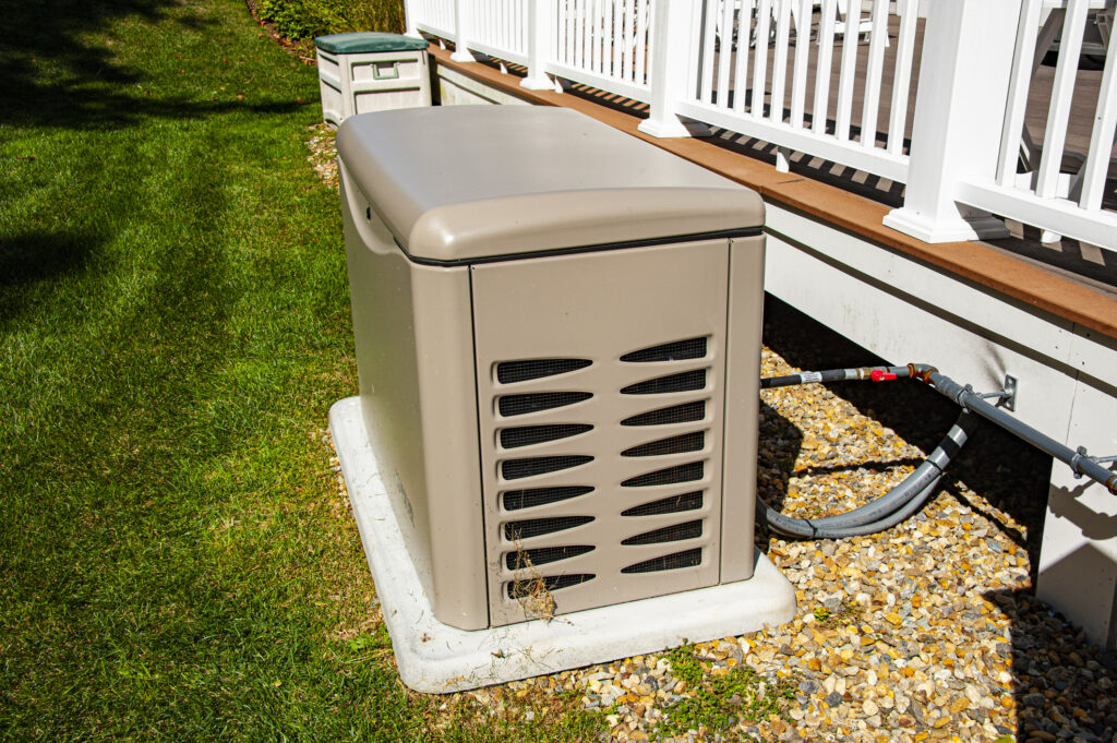 Whole-house standby generator in a backyard in New Orleans