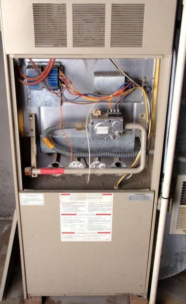 Home furnace repairs being completed by professionals