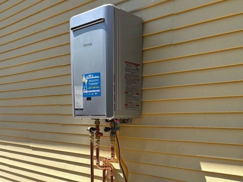Tankless water heater installed outside.